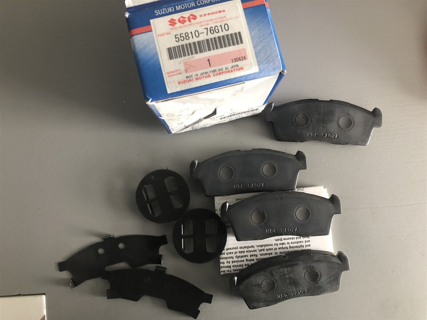 NEW Genuine Suzuki ALTO 2000-06 Front Brake Pads Pad Set 4 55810-76G10