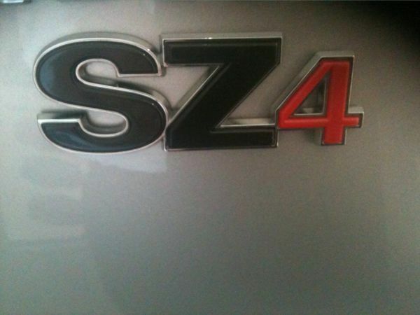 NEW Genuine Suzuki SZ4 Tailgate Boot BADGE Chrome Red EMBLEM BADGE-SZ4